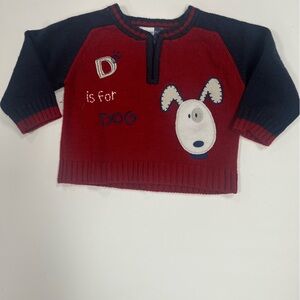 Red and navy blue sweater